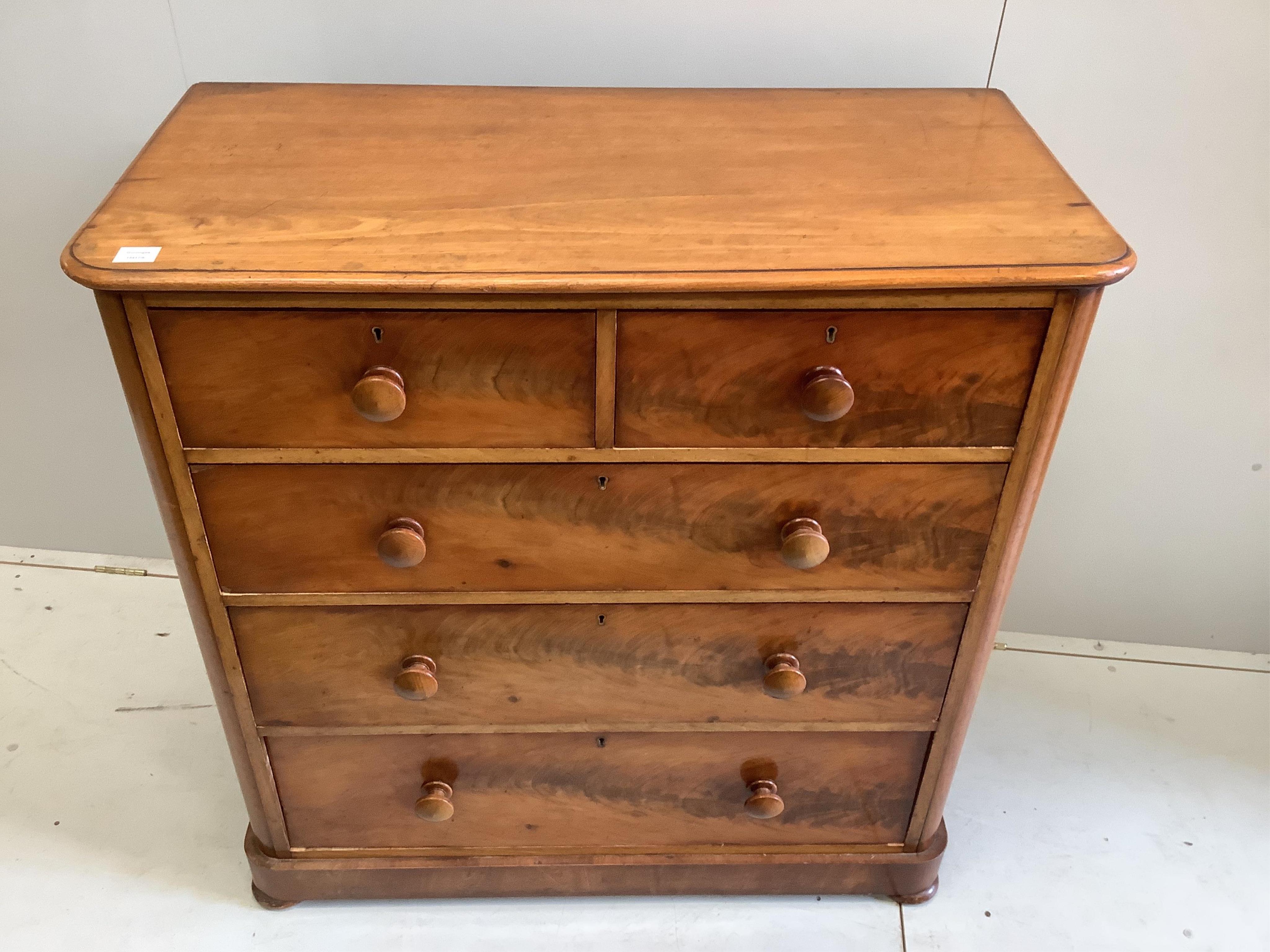 A Victorian mahogany chest of five drawers, width 111cm. depth 55cm, height 113cm. Condition - fair-good